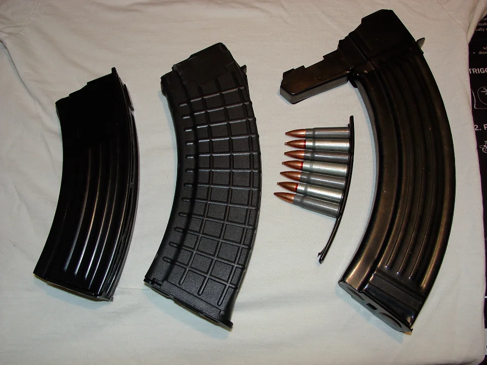 From left to right: Mini-30 magazine [20 round], AK-47 magazine [30 round], SKS stripper clip [10 round] with alternating Wolf and Silver Bear ammunition, and SKS detachable magazine [30 round].
