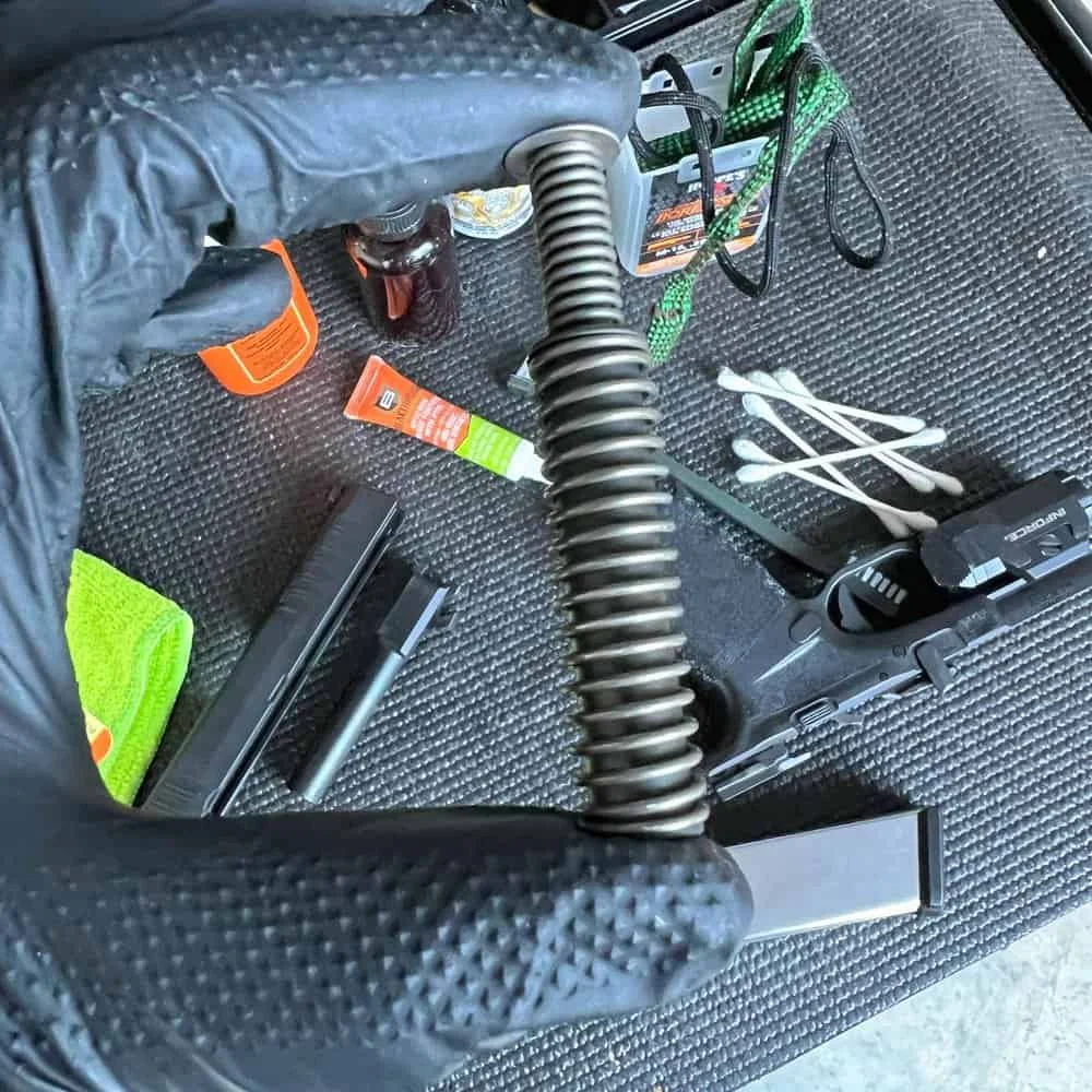 guide rod recoil spring cleaning gun