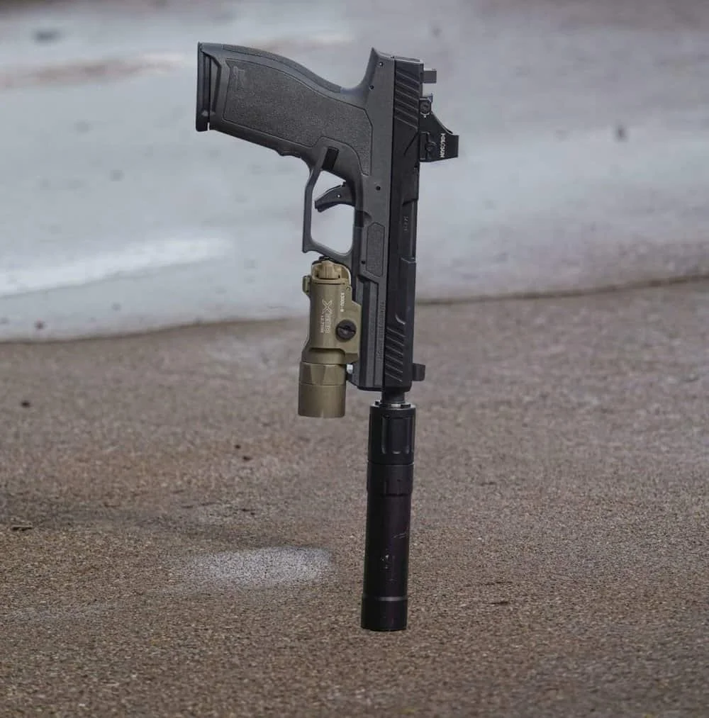 psa 5.7 rock review with holosun 407k yhm suppressor and surefire light