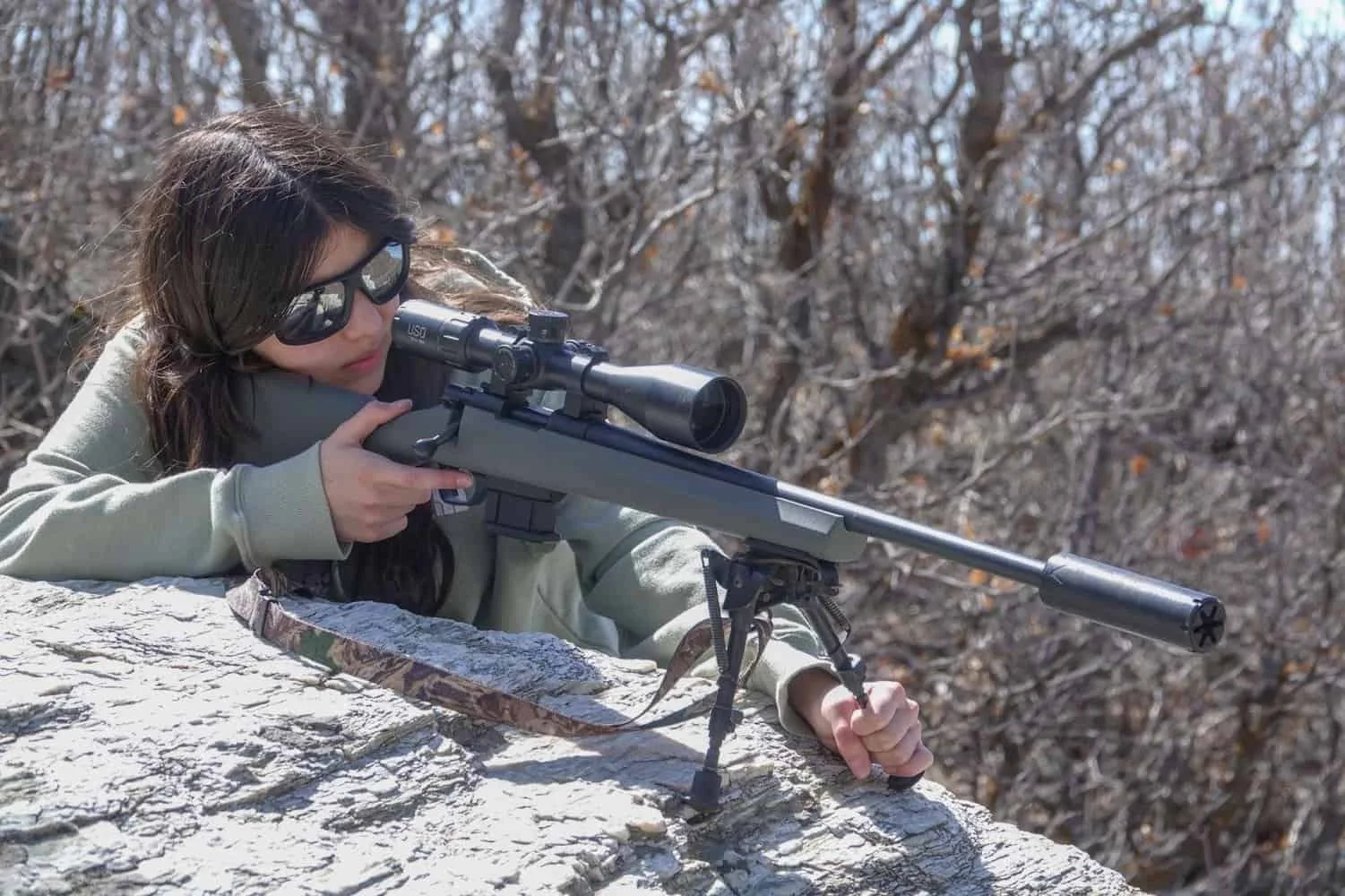female shooter testing the howa mini 6mm arc