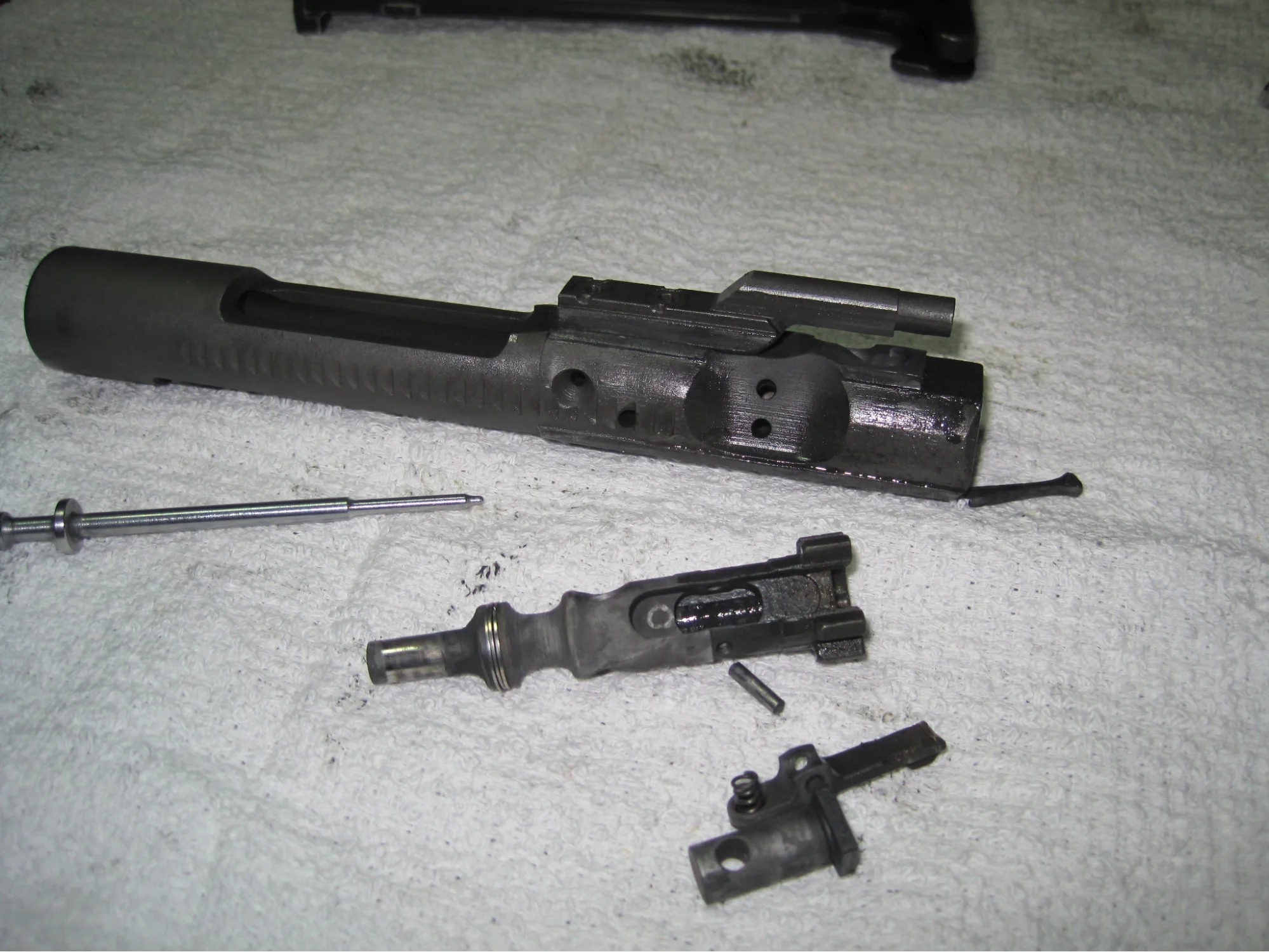 Bolt Carrier Group on DI gun. Look at that carbon buildup and wear