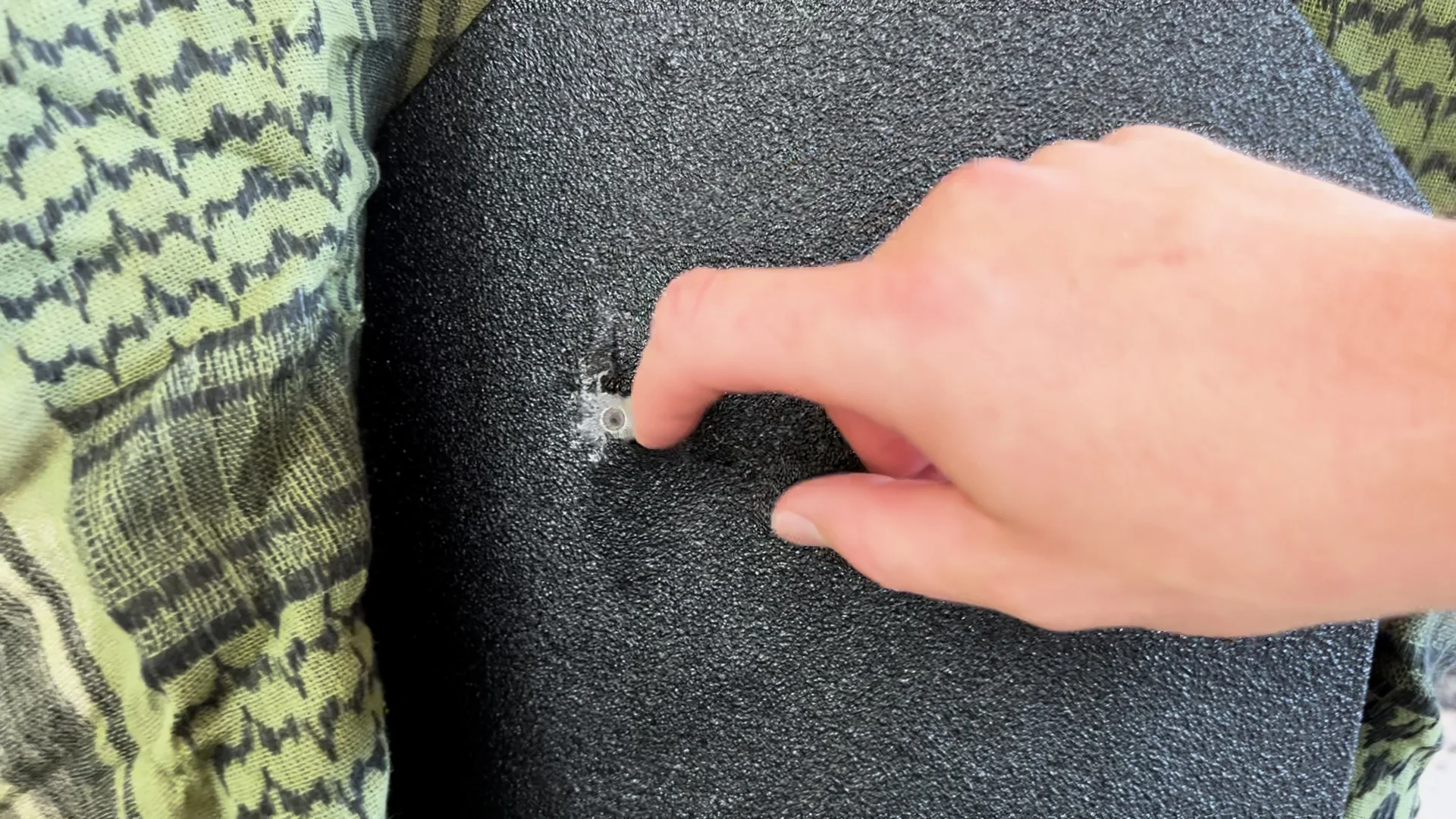 RTS Tactical level iii+ plate test impact mark from the 124-grain 9mm round shot out of the Glock 17