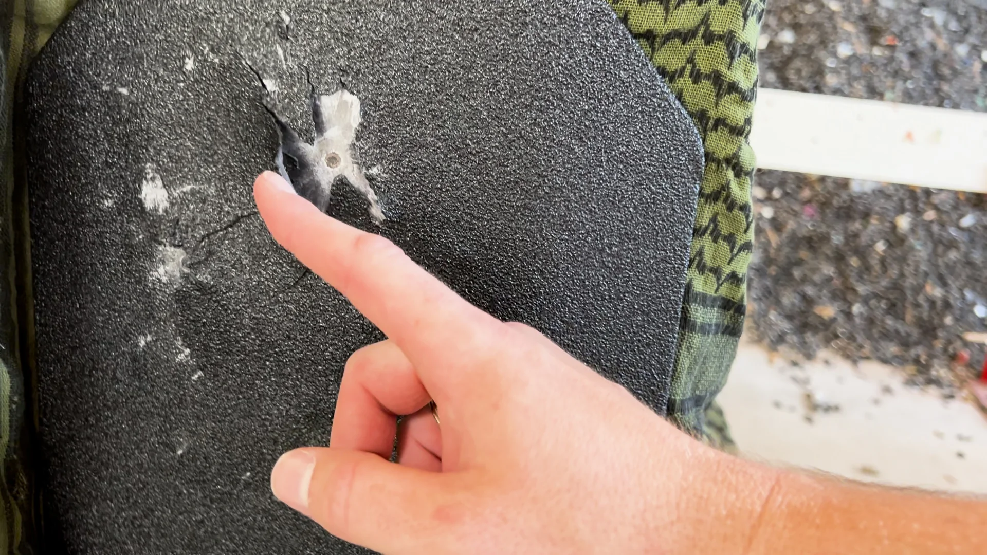 RTS Tactical level iii+ plate test impact mark from the 124-grain 9mm round shot out of the Grand Power Stribog