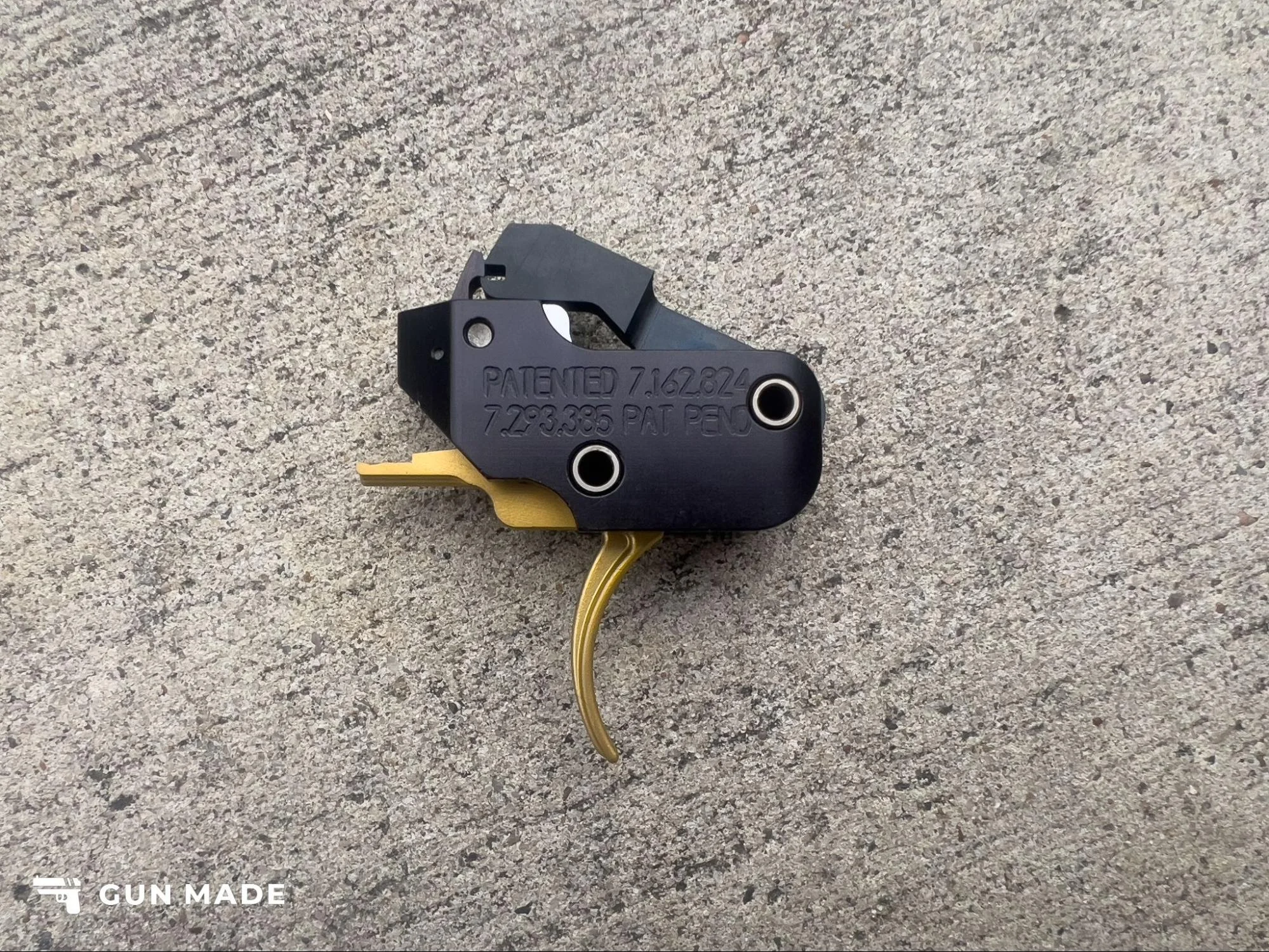 American Trigger Corp AR Gold Adjustable Trigger close up