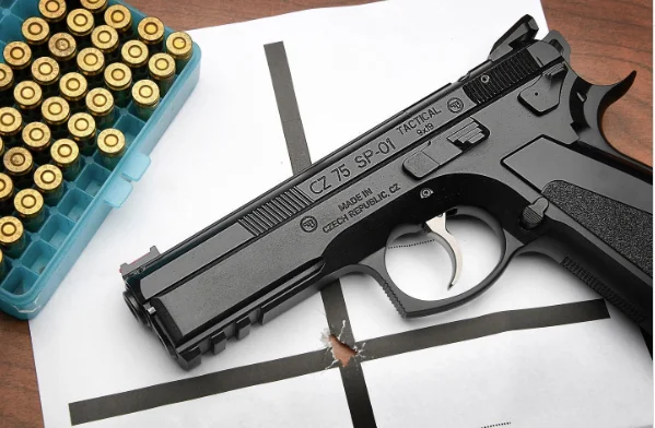 CZ 75 SP-01 with ammo background
