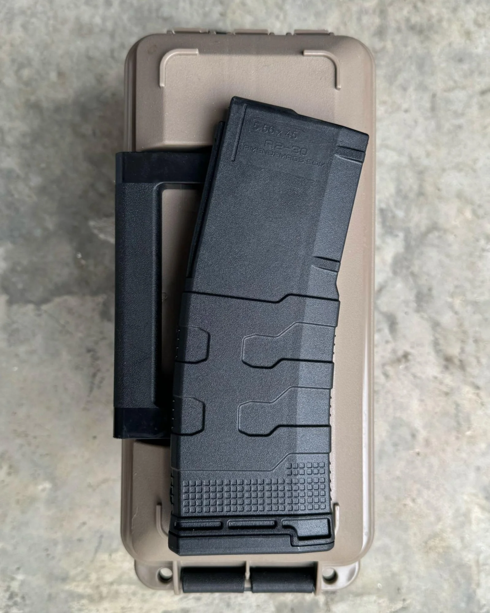Detailed view of the Amend2 Mod-3 magazine, emphasizing the grooves and contours designed for a secure grip