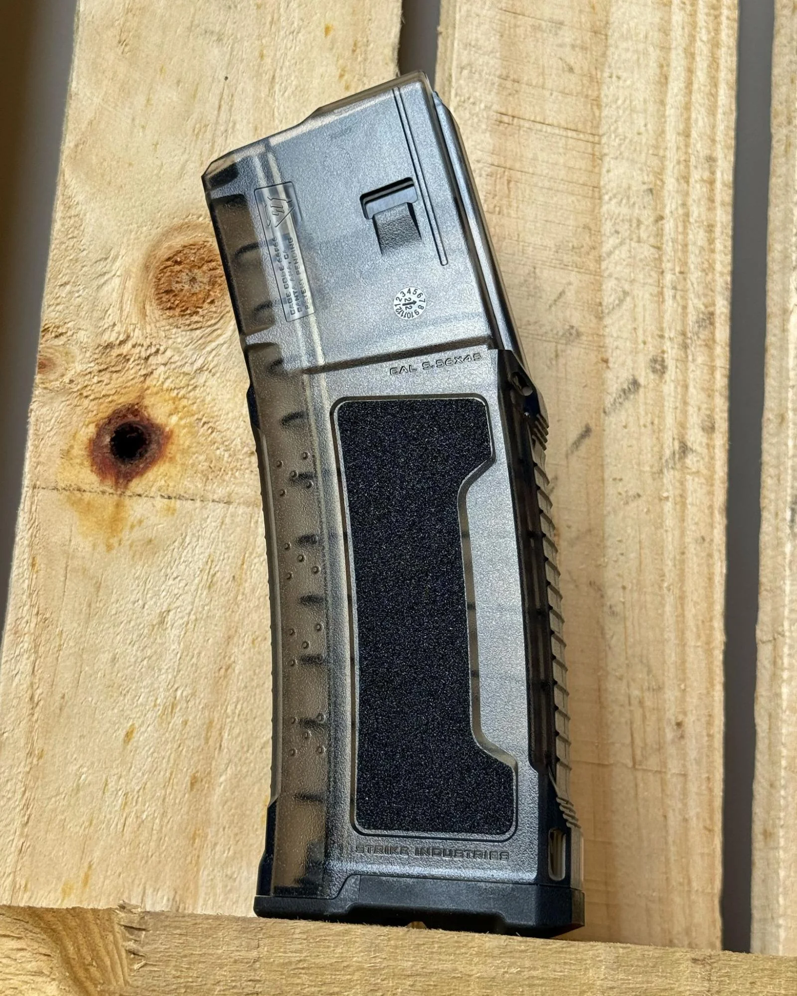 Strike AR-15 magazine, possibly shown loaded with rounds, emphasizing its aesthetic appeal