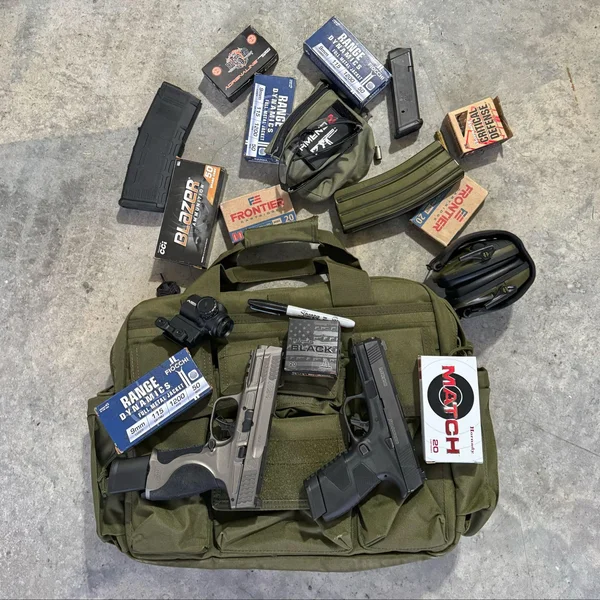 Bail Out Bag with a variety of guns and other items