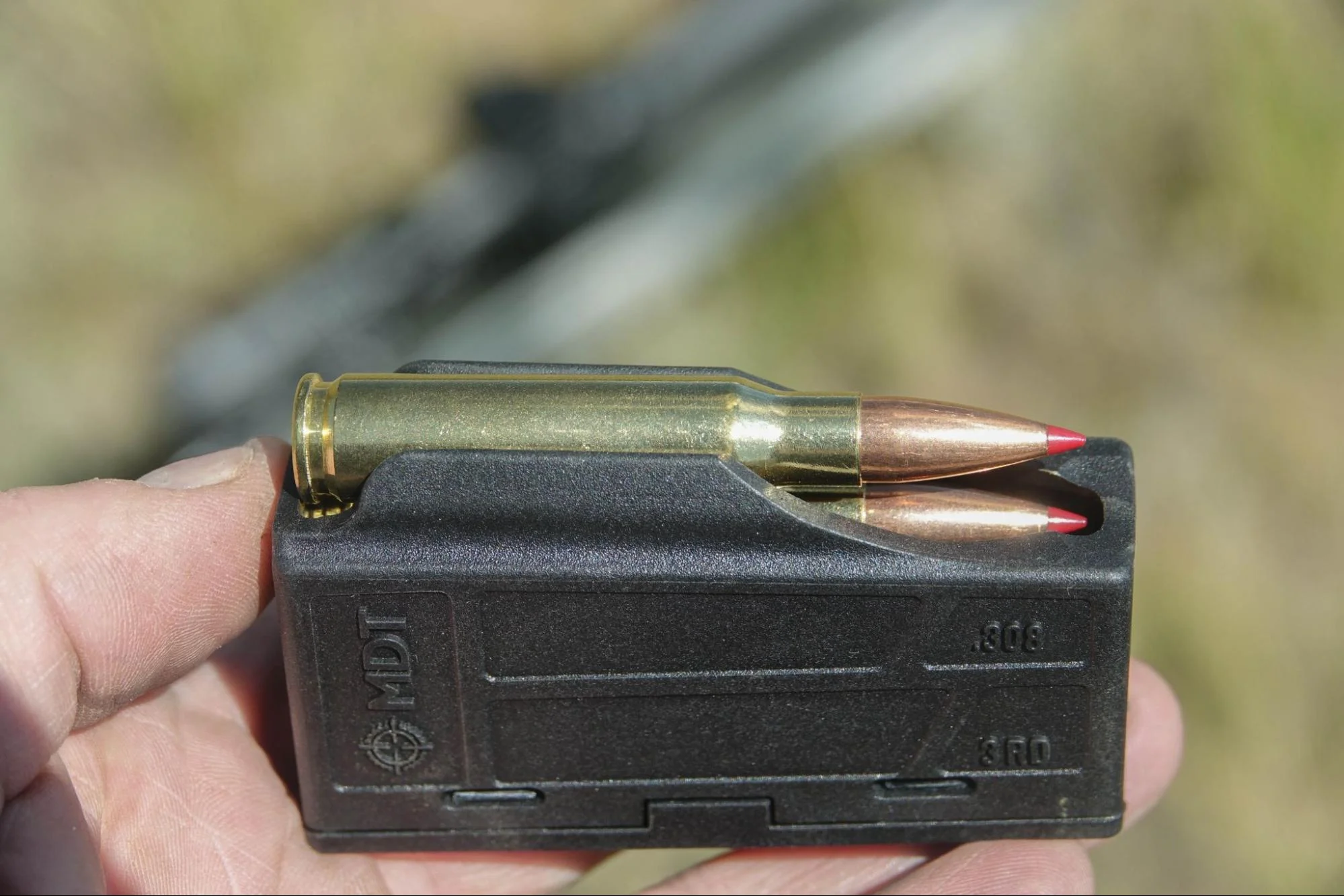 Close-up view of the three-round magazine of the Springfield Armory Model 2020 Redline rifle