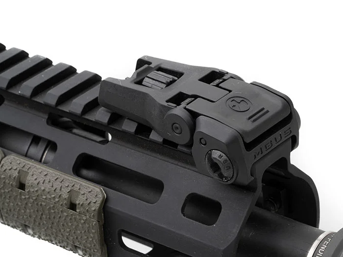Low-profile folded backup iron sights by Magpul on an AR-15
