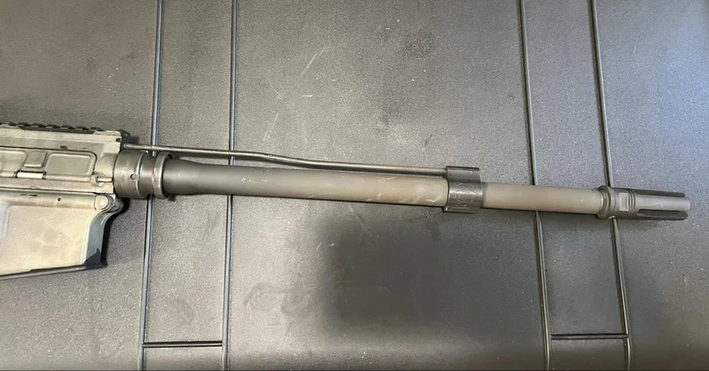 Close-up of Rosco HBAR barrel with phosphate coating displaying subtle color change after extended use.