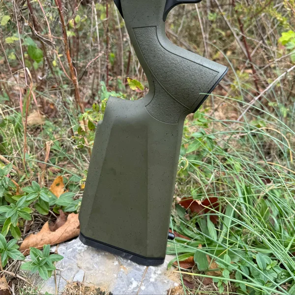 The Model 2020 Rimfire rifle with its OD green and black webbing finish, reflecting Springfield’s attention to design and durability, ideal for any firearm enthusiast’s collection