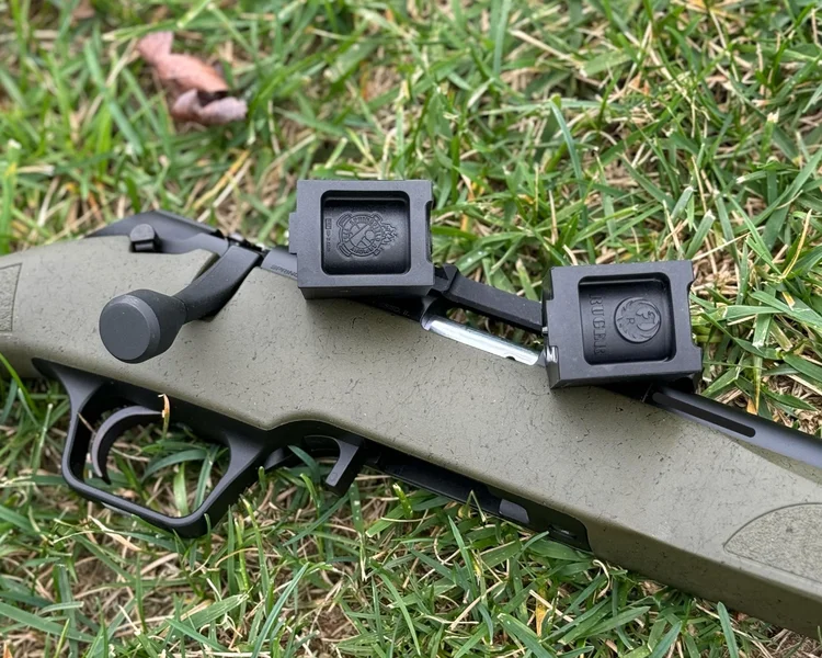 The Springfield Model 2020 Rimfire displayed with a compatible Ruger rotary magazine, highlighting the versatility of the rifle’s magazine options