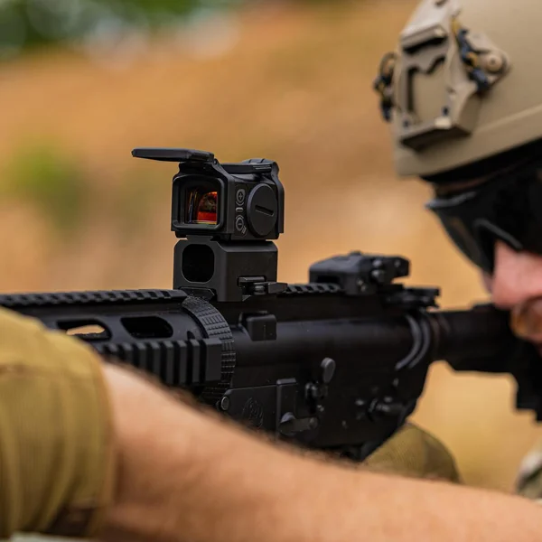 Aimpoint Acro C-2 optic mounted on a B&T quick-detach mount, ready for easy rifle swaps