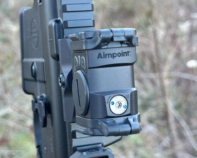 Close-up of Aimpoint Acro C-2 windage and elevation dials with a suggestion for a solar panel addition