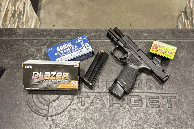 Springfield Armory Echelon 4.0C alongside three types of ammunition used during testing