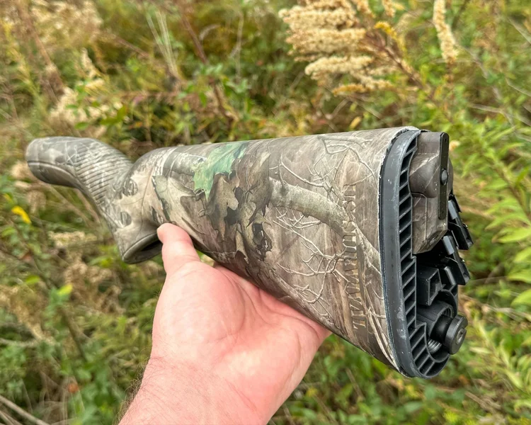 Henry Survival Rifle disassembled and stored neatly in its compact buttstock