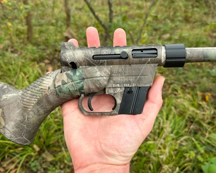 Straightforward and functional safety and magazine release controls on the Henry Survival Rifle