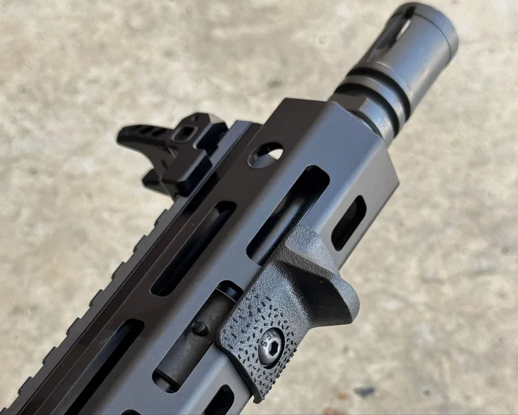 Close-up of Springfield Saint Victor Pistol muzzle and M-LOK handguard with pre-installed compact handstop