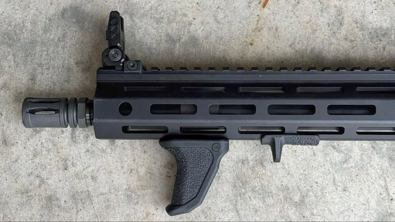 Left-side view of Springfield Saint Victor Pistol with Emissary Handbrake X and flip-up front sight installed on M-LOK handguard