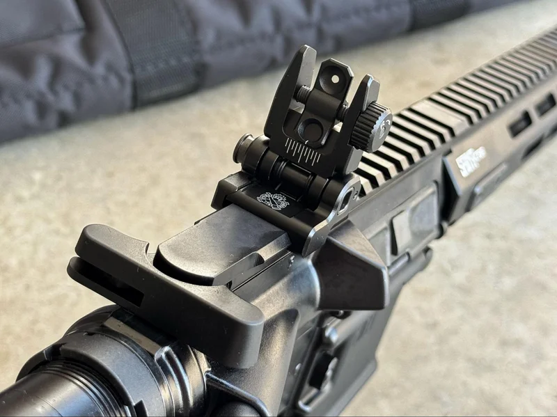 Rear view of Springfield Saint Victor Pistol with spring-loaded flip-up rear sight and full-length Picatinny rail