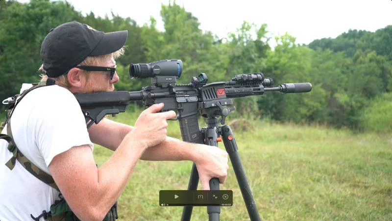 Shooter using Goyojo GRL335 thermal scope mounted on a rifle during a range test