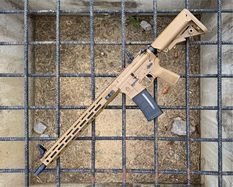 Springfield Armory Saint Victor V2 rifle flat lay on concrete grid background