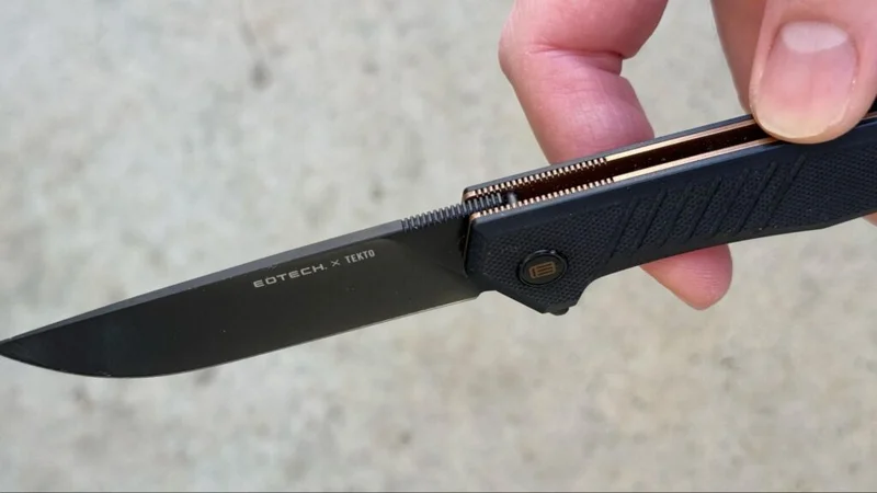 Close-up of the Tekto F1 Alpha EOTECH knife blade and jimping details