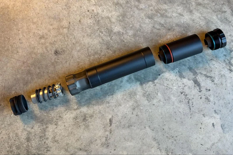 Disassembled view of the Silencer Central BANISH 45 suppressor showing modular components and internal baffles