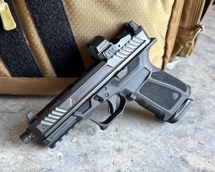 Complete Strike Arms compact pistol build with Strike Industries components and a Hexion Tech Seeker red dot sight.