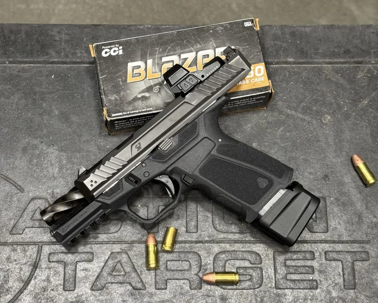 Profile view of the Strike Arms pistol highlighting the ergonomic curves, slide contouring, and optic-ready mount.