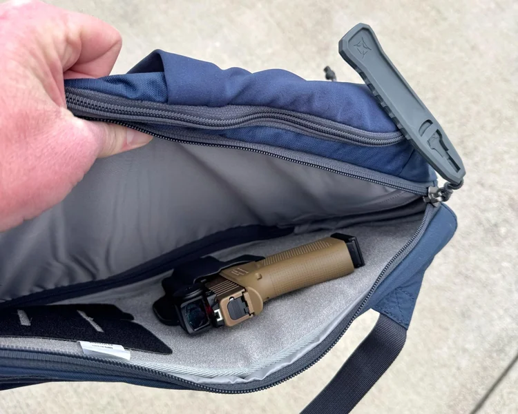 Concealed carry compartment in Vertx Gamut 26L backpack holding a Glock 43X