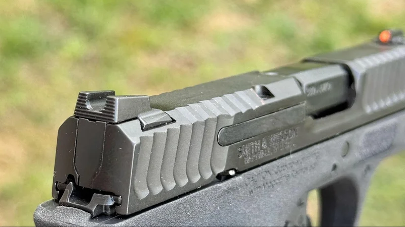Tritium front sight and serrated rear sight on a Smith & Wesson Bodyguard 2.0 slide