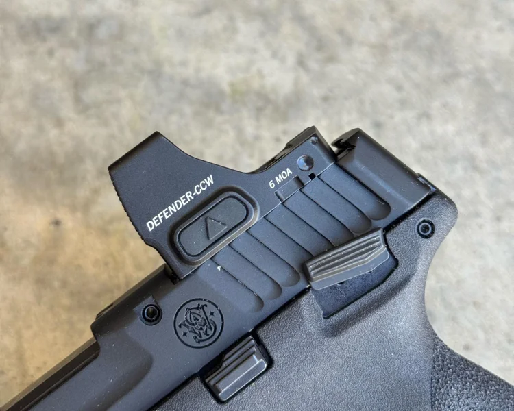 Vortex Defender CCW red dot sight mounted on the optics-ready slide of an M&P22X pistol