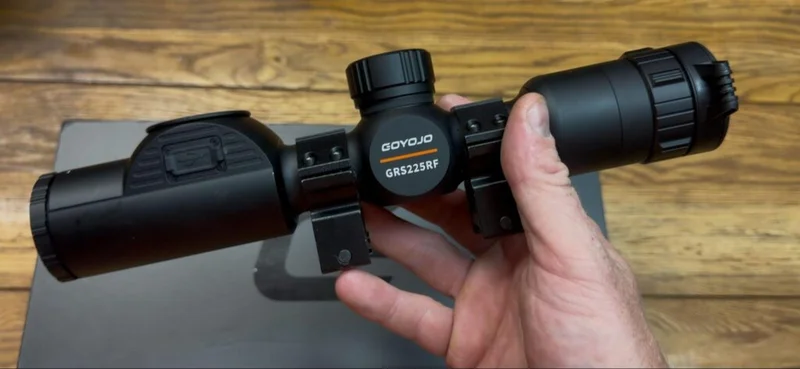 Goyojo GRS225RF thermal scope held in hand with its included 30mm scope rings