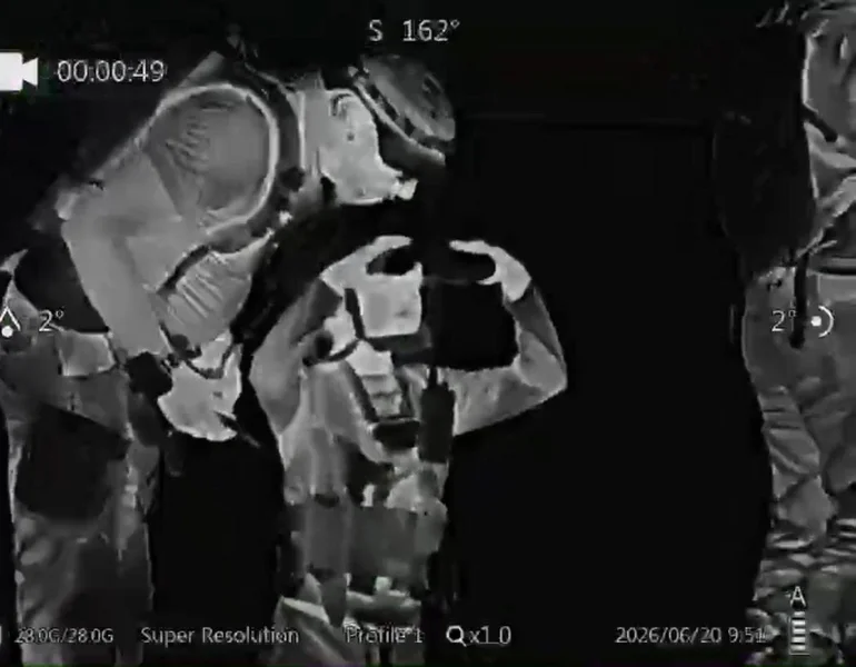Two people at close range in white hot through the Goyojo GRS225RF thermal scope